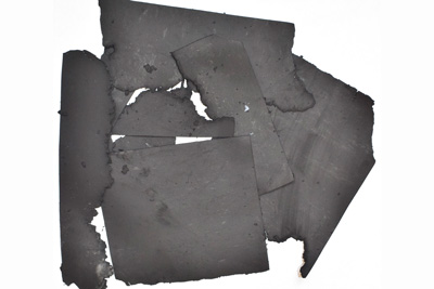 Activated carbon before and after being processed by a Screen Classifying Cutter.